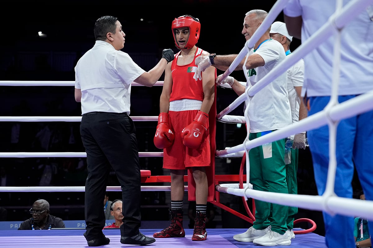 Algeria's Imane Khelif prepares to fight Italy's Angela Carini in their women's 66kg preliminary boxing match at the 2024 Summer Olympics, Thursday, Aug. 1, 2024, in Paris, France.  - (AP Photo/John Locher)
